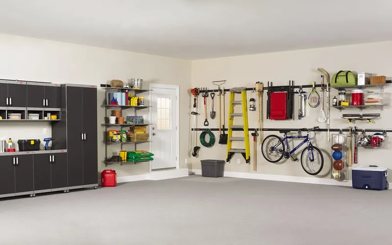 Bright garage with cabinets, wall rails, shelving and a hanging bike